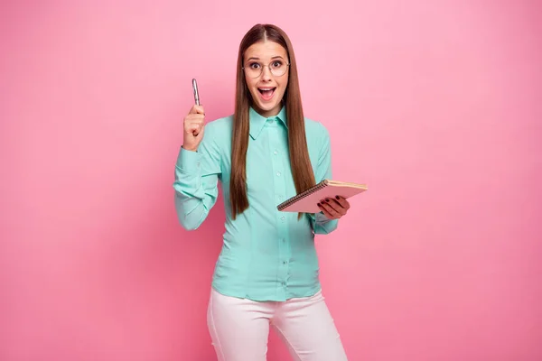 Astonished crazy girl write report copybook get wonder idea impressed raise pen up scream wow omg wear teal turquoise style stylish trendy white pants trousers isolated pastel color background — Stockfoto