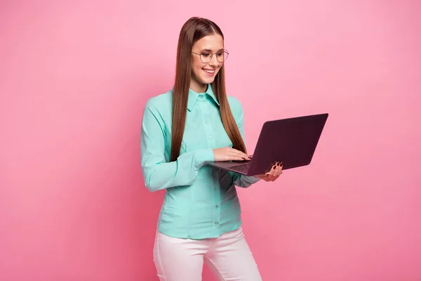 Portrait of intelligent positive ceo worker girl work on computer netbook have partnership online conversation wear good look teal clothes isolated over pastel color background — Zdjęcie stockowe