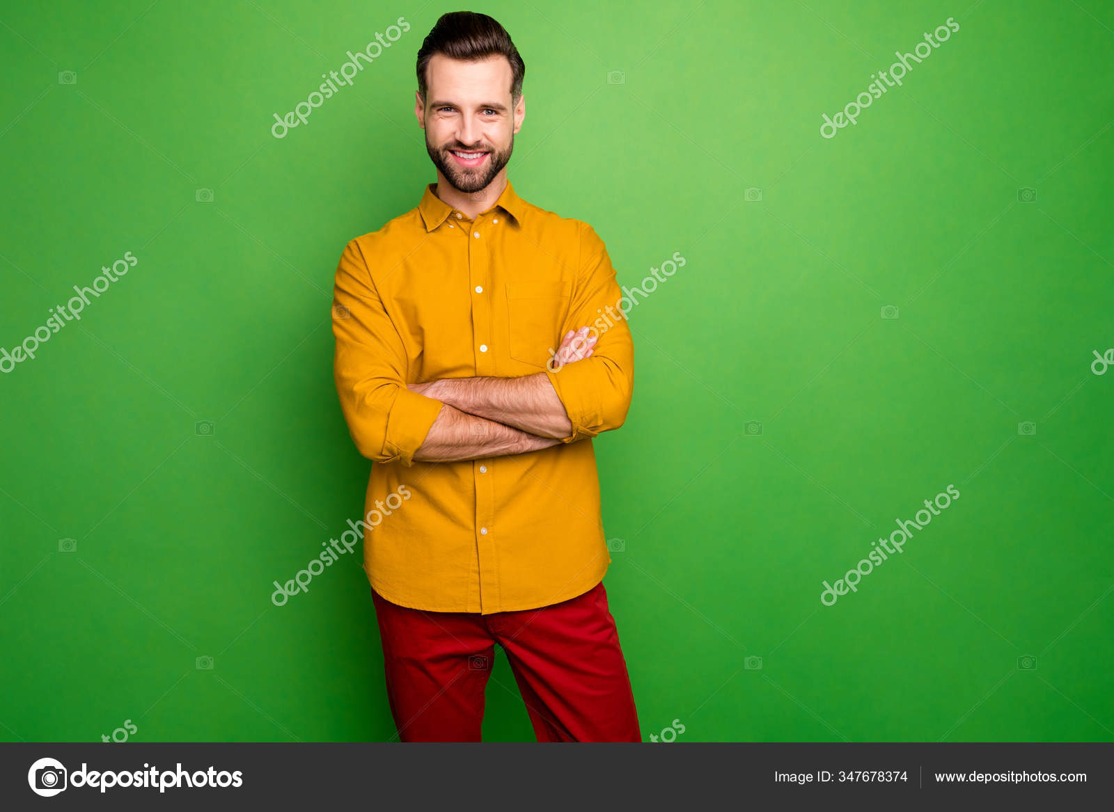 Photo of handsome young business man bossy crossed arms friendly