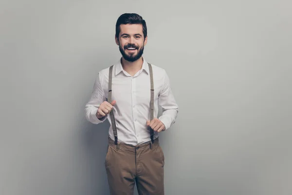 Portrait of candid imposing guy enjoy dream dreamy rest relax pull suspenders wear good look outfit isolated over grey color background — 图库照片