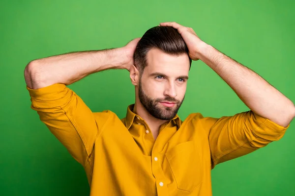 Close-up portrait of his he nice attractive well-groomed bearded guy touching hair modern coiffure haircut isolated over bright vivid shine vibrant green color background — Stok fotoğraf