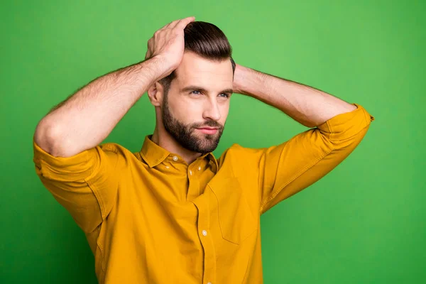 Photo of good mood young business man holding hands on prefect hairdo looking mirror love himself formalwear yellow shirt isolated bright green color background — Stock Photo, Image