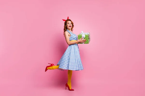 Full length photo of excited crazy lady get dream package big giftbox hold impressed scream wow omg wear blue dress yellow stockings isolated over pink color background — 스톡 사진