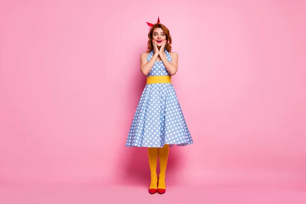 Full size photo of excited good look lady hear incredible novelty scream wow omg impressed touch hands face wear blue yellow bright stockings isolated pink color background — 스톡 사진