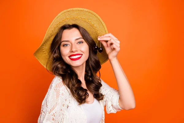Photo of wavy charming curly wavy pretty cute nice girlfriend showing you two cherries offering to taste smiling toothily isolated over vivid color background — Stockfoto