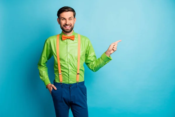 Portrait of his he nice attractive elegant imposing cheerful cheery guy wearing festal shirt demonstrating copy space isolated on bright vivid shine vibrant blue green teal turquoise color background — Stockfoto