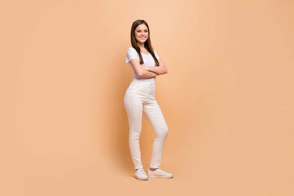 Full length photo of content attractive girl cross her hands enjoy working spring rest relax day wear good look modern youth clothes isolated over pastel color background — Stok fotoğraf
