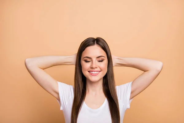 Top above high angle view photo of positive cheerful satisfied girl lei enjoy rest relax spring free time sleep with closed eyes wear good look outfit isolated over beige color background — Stockfoto