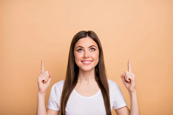 Portrait of positive cheerful girl promoter point index finger copyspace up recommend suggest select ads promotion wear modern outfit isolated over pastel color background — Stockfoto