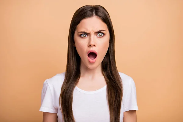 Closeup photo of beautiful pretty lady shocked open mouth speechless not satisfied see big shopping prices wear white t-shirt isolated beige pastel color background — Φωτογραφία Αρχείου