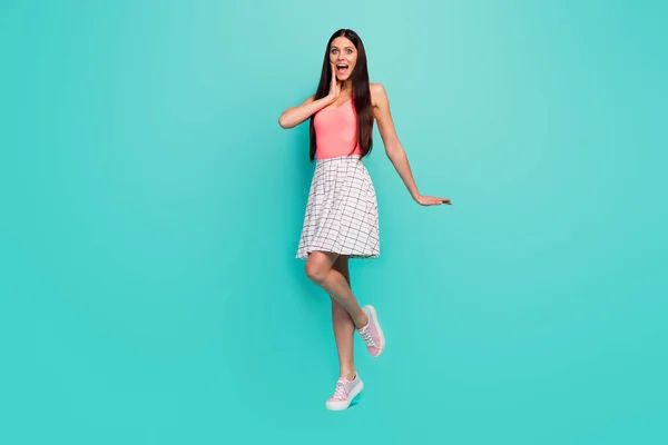 Full size photo of astonished positive cheerful girl rest relax see wonderful black friday sales news impressed scream wow omg wear pastel singlet shoes isolated pastel color background — Stockfoto