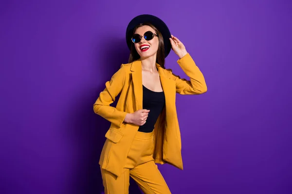 Portrait of cheerful lovely charming girl have free time enjoy her fall holidays touch retro hat wear good look outfit isolated over violet color background — Stockfoto