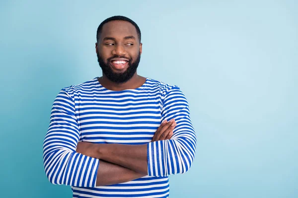 Portrait of cheerful afro american guy job sailor worker cross hands look copyspace listen to his friends colleagues wear trendy nautical vest frock isolated over blue color background — Stok fotoğraf