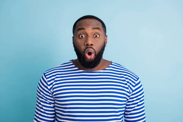 Portrait of astonished afro american guy look incredible novelty impressed scream wear nautical sailor outfit isolated over blue color background — Stockfoto
