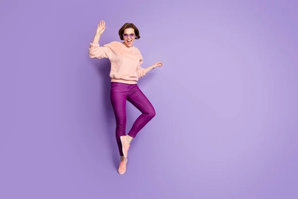 Full size photo of crazy funky girl dance enjoy loud music party event have free time feel carefree emotions wear good look soft clothes isolated over purple color background — Stock Fotó