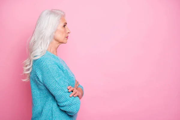 Profile side photo of pensive strict old woman serious professional cross hands look copyspace listen her employees decisions choices wear autumn pullover isolated pastel color background — Stock Photo, Image