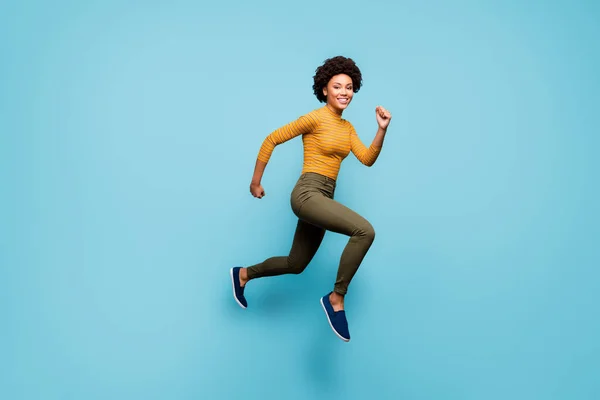 Full length body size view of nice lovely healthy cheerful active confident strong wavy-haired girl running having fun isolated on bright vivid shine vibrant blue green teal turquoise color background — Stok fotoğraf