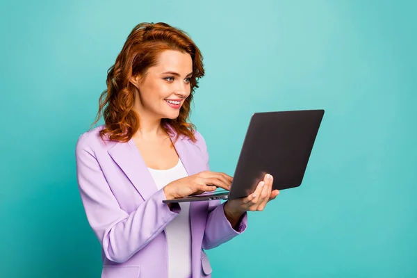 Close-up portrait of her she nice attractive pretty focused cheerful wavy-haired lady IT specialist holding in hands laptop isolated on bright vivid shine vibrant blue green turquoise color background — Stock Photo, Image
