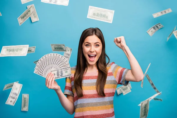 Close-up portrait of her she nice lovely lucky cheerful cheery glad girl holding in hand fan us dollars sale discount rejoicing isolated over bright vivid shine vibrant blue color background — 스톡 사진