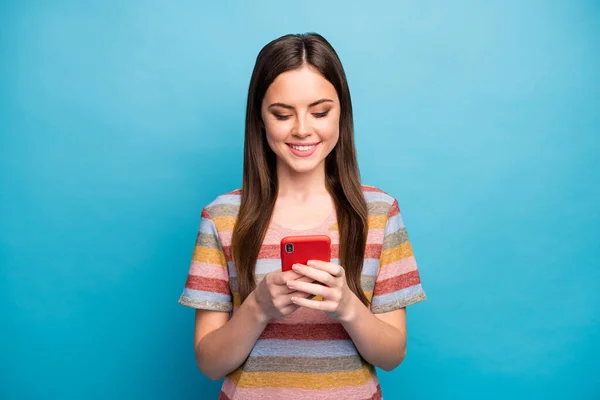 Close-up portrait of her she nice lovely pretty charming cute cheerful cheery girl using cell creating smm blog isolated over bright vivid shine vibrant blue color background — Stock Photo, Image