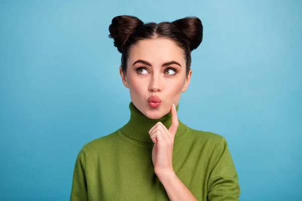 Closeup photo of pretty cute lady look side up empty space think creative idea arm on chin dreamer send air kisses wear warm green turtleneck pullover isolated blue color background — Stock Photo, Image