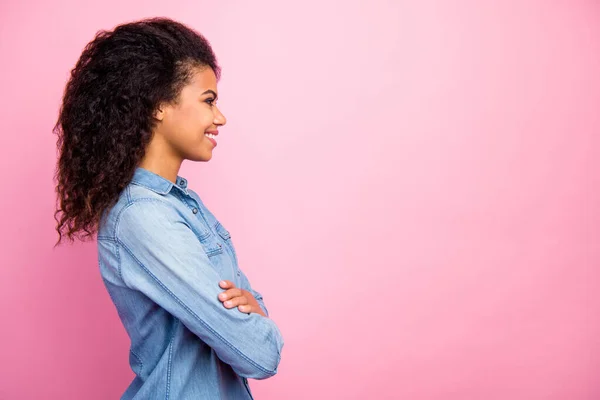 Profile side of charming cute girlish afro american girl look copyspace cross hands wear casual style clothing isolated over pink color background — Stock Photo, Image