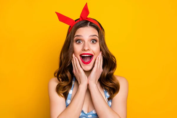 Portrait of cheerful excited girl hear incredible discounts impressed scream touch hands face wear polka-dot tank-top isolated over bright color background — Stock Photo, Image