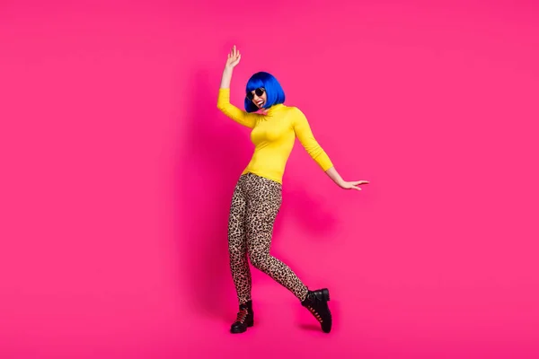 Full body photo of crazy funny lady youth strange moves students costume party wear specs yellow turtleneck blue bob wig boots leopard pants isolated bright pink color background