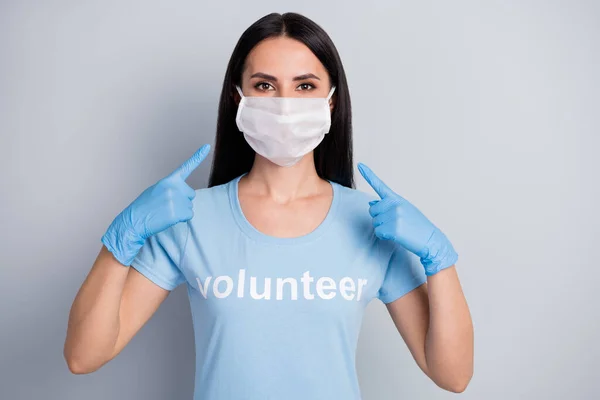 Close-up portrait of her she nice-looking attractive lovely pretty girl medic doc voluntary work worker job wearing demonstrating protective mask isolated over grey pastel color background