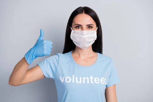 Close-up portrait of her she nice attractive content girl medic doc voluntary showing thumbup ad advice therapy isolated over grey pastel color background