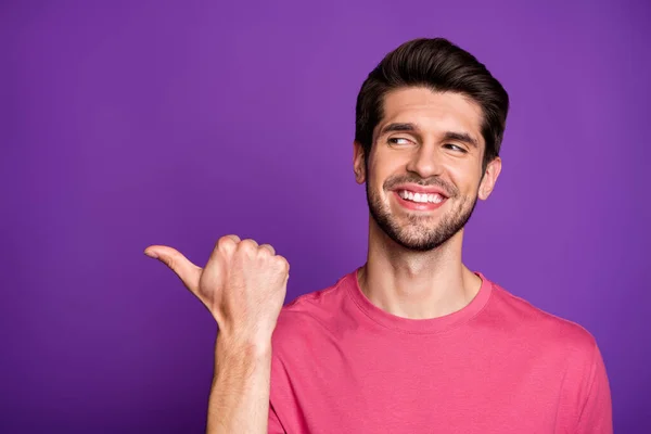 stock image Look shopping center is over there. Portrait of positive cheerful guy promoter point forefinger present ads promotion recommend suggest select wear outfit isolated vivid color background