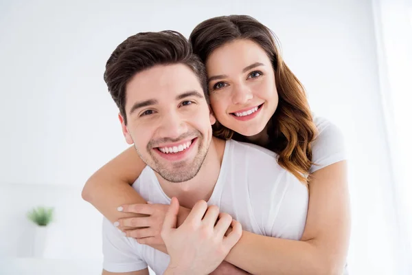 Closeup photo of adorable lady cheerful handsome guy married couple in love enjoy weekend saturday morning good excited mood hugging hold hands wear pajama room indoors — Stock Photo, Image