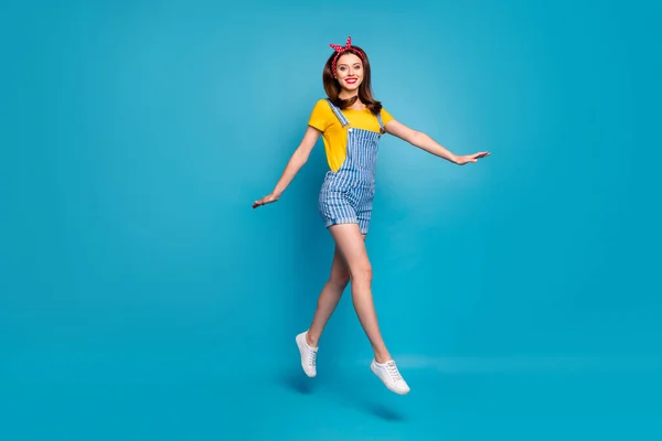 Full length body size view of her she nice attractive trendy girl jumping walking having fun strolling free time isolated on bright vivid shine vibrant blue green teal turquoise color background — Stock Photo, Image