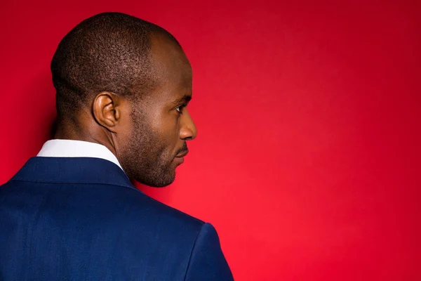 Close-up rear profile side view portrait of his he nice attractive luxury content guy banker lawyer attorney economist company owner isolated over red maroon burgundy marsala color background