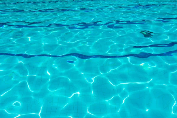 Blue ripple water in swimming pool — Stock Photo, Image