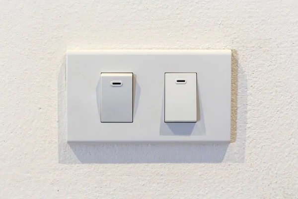 Light socket on white wall — Stock Photo, Image