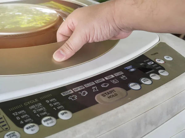 Man Open Washing Machine Door Doing Laundry — 스톡 사진