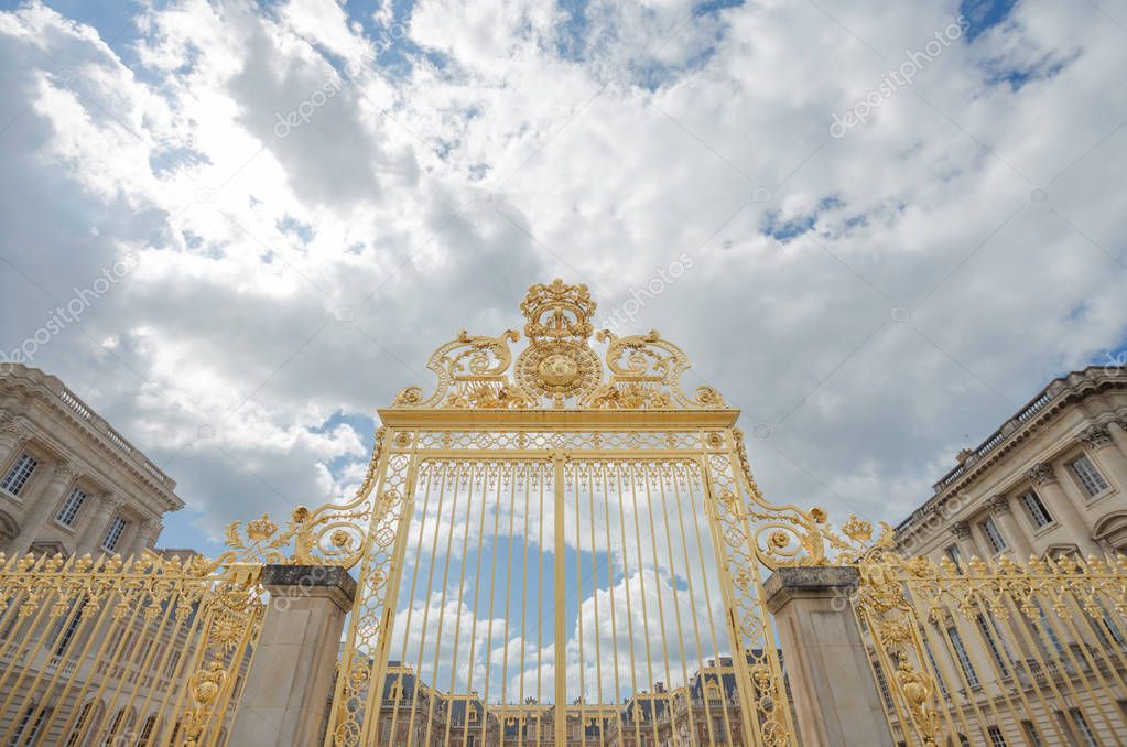 Versailles chateau. France. View of golden gate to palace. Royal