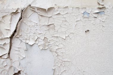 Antika arka plan doku duvar eski çimento çatlaklar ile eski boya izleri üzerinde eski tuğla.
