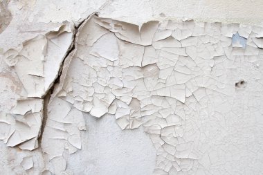 Antika arka plan doku duvar eski çimento çatlaklar ile eski boya izleri üzerinde eski tuğla.