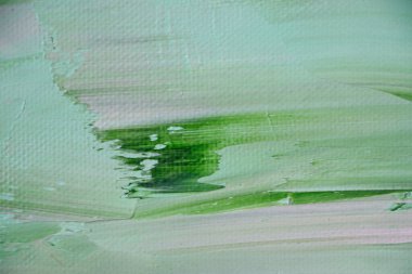 Boyanın yeşil tonlardaki desenli arkaplanı, seçici odak