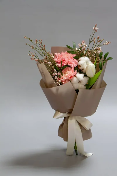 Close Fresh Bouquet Carnation Tulip Cotton Genista Pistachio Gray Background — Stock Photo, Image