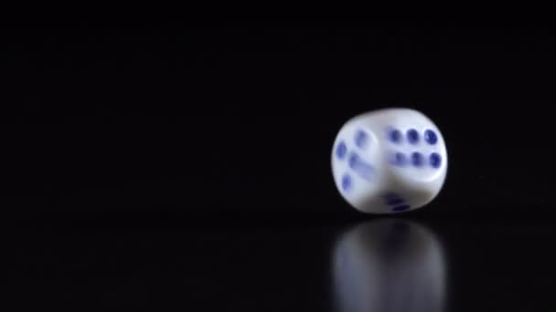 Dice throw on a black table — Stock Video