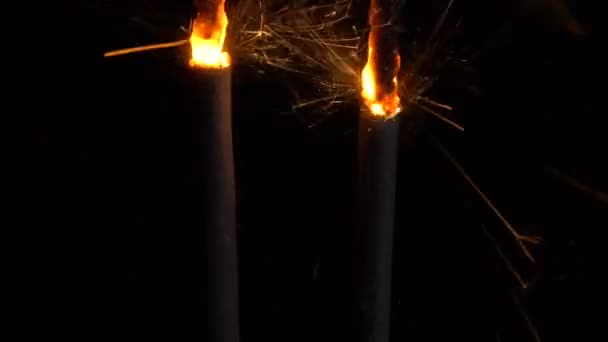 Burning sparklers in the dark — Stock Video