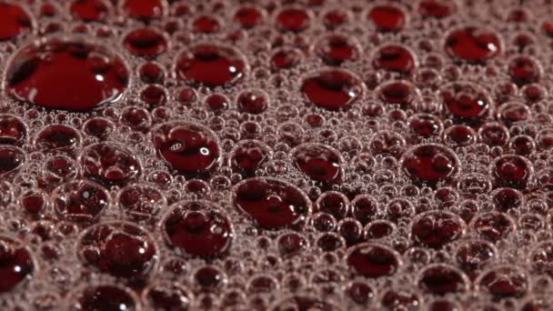 Foam in the cherry juice — Stock Video