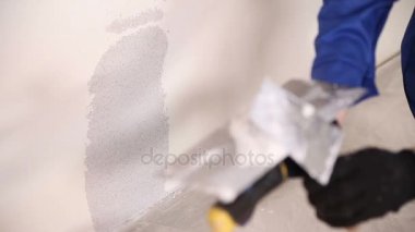 Sıva bir spatula ile Kepçe