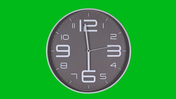 Reloj de pared sobre fondo verde. Vueltas de tiempo — Vídeo de stock