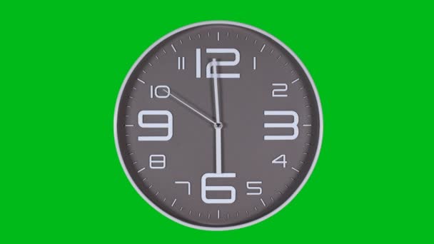 Reloj de pared sobre fondo verde — Vídeos de Stock