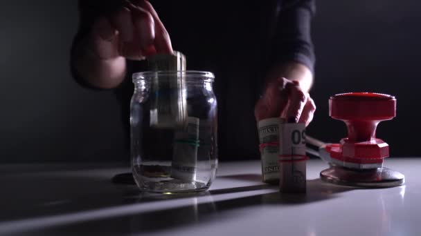 Dollars are closed in a secreted jar — Stock Video