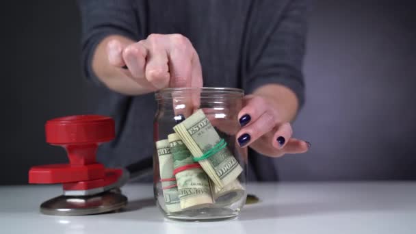 Dollars are closed in a secreted jar — Stock Video